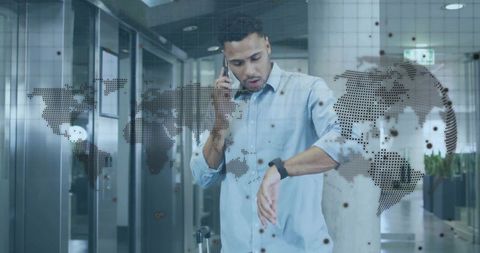 Businessman Checking Smartwatch with Phone and Luggage at Airport
