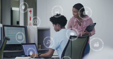 Innovative Business Team Analyzing Digital Data in Modern Office