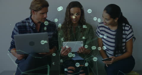 Three Colleagues Collaborating with Digital Devices and Icon Overlay