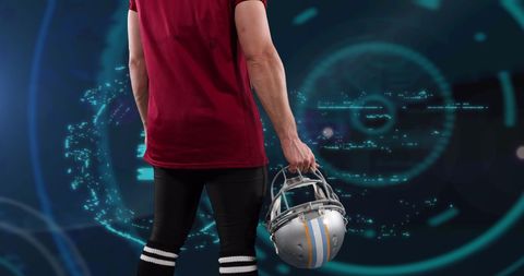Football Player Holding Helmet with Digital Background - Download Free Stock Images Pikwizard.com