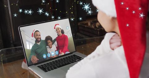 Child in Santa Hat Video Calling Family During Christmas Celebrations - Download Free Stock Images Pikwizard.com
