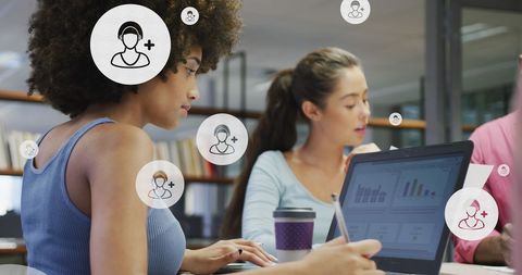 Team Analyzing Social Media Data in Modern Office