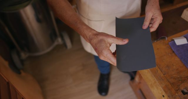 Craftsman Sanding with Abrasive Paper in Workshop - Download Free Stock Images Pikwizard.com