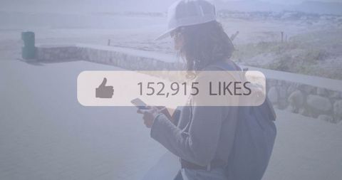 Young Woman Checking Smartphone with Rooftop Likes Overlay