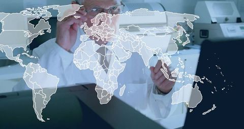 Scientist examining global map overlay in high-tech laboratory