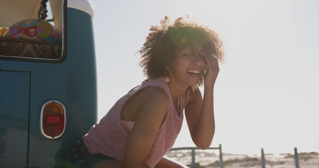 Young woman joyfully relaxing during a beach trip - Download Free Stock Images Pikwizard.com