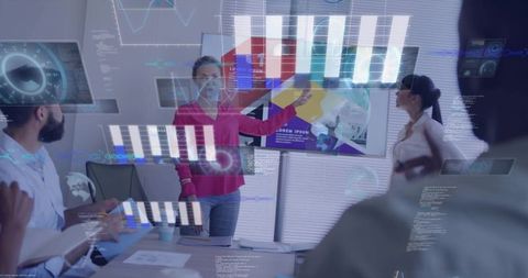Business team collaborating around digital display while woman presenting data overlays