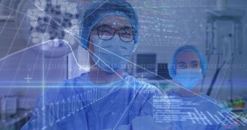 Surgeon reviewing holographic medical analytics in operating room for precision teamwork