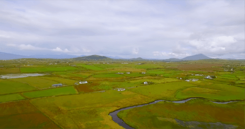 transparent sky over lush green landscape and rolling hills - Download Free Stock Videos Pikwizard.com
