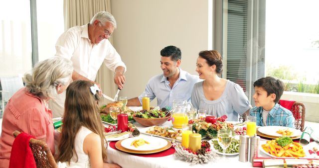 Multi-generational Family Enjoying Festive Meal Together at Home - Download Free Stock Images Pikwizard.com