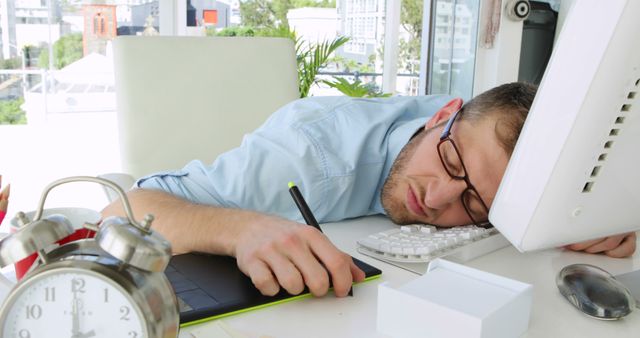 Handsome businessman sleeping in his office - Download Free Stock Photos Pikwizard.com