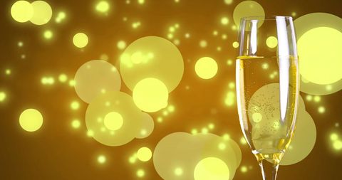 Champagne Glass with Festive Yellow Bokeh Design - Download Free Stock Images Pikwizard.com