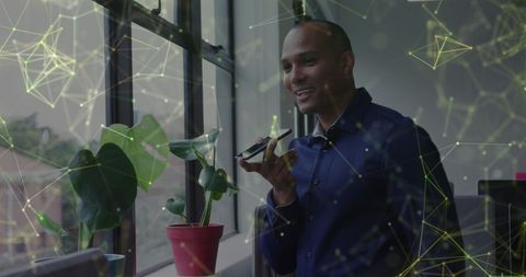 Businessman Engaging with Phone Amid Digital Connections Overlay
