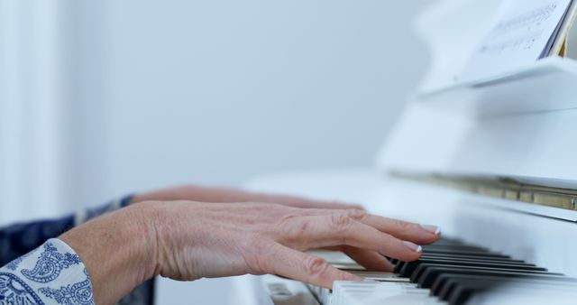 Senior Playing Piano in Well-Lit Room - Download Free Stock Images Pikwizard.com