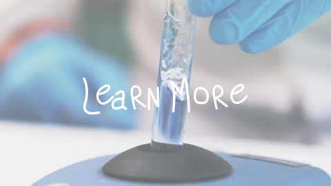 Laboratory Experiment Tube with Learn More Text Overlay