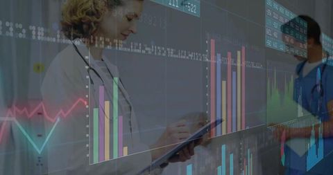 Female Doctor Analyzing Digital Charts in Hospital Corridor