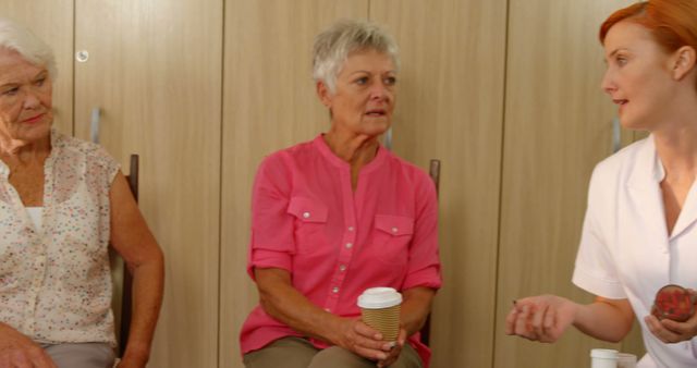 Group of Elderly Women Receiving Guidance from Caregiver - Download Free Stock Images Pikwizard.com