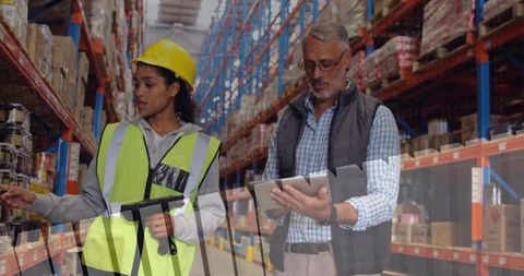 Warehouse Workers Scanning Inventory for Efficient Stock Management
