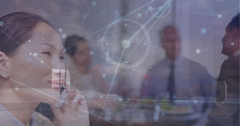 Asian woman on cellphone overlaid with gym and digital connections