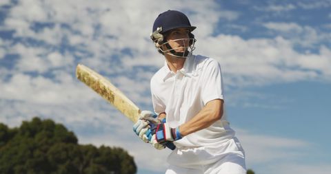 Cricket Player in Action on Sunny Day - Download Free Stock Images Pikwizard.com