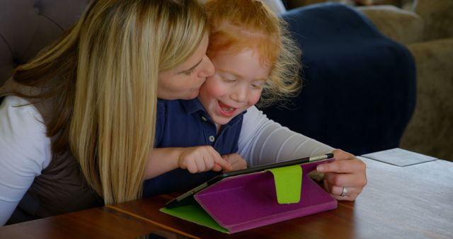 Mother and Daughter Interaction with Tablet - Download Free Stock Images Pikwizard.com