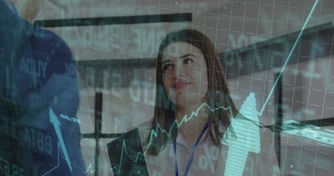 Professional Colleagues Discussing Financial Analytics with Digital Charts Overlay