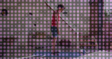 Male Teenager Balancing on Slackline Between Brick Pillars Patio Urban Outdoor Adventure