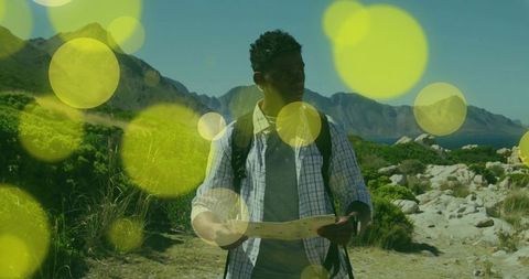 Male hiker exploring coastal terrain with overlay effect