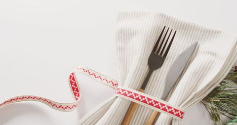 Festive Christmas Cutlery Setting with Red Accents - Download Free Stock Images Pikwizard.com