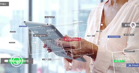 Woman holding tablet and stylus interacting with augmented reality ui in modern office