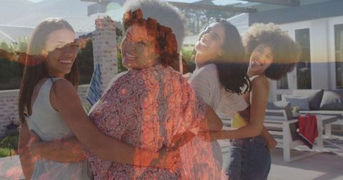 Diverse Group of Friends Linking Arms in Backyard Celebration