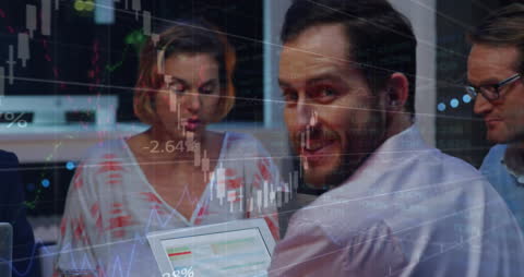 Business Team Analyzing Market Data in Modern Office Setting