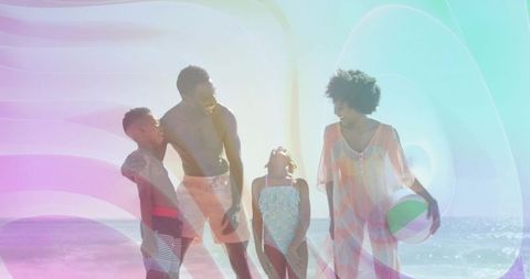 Joyful Family Enjoying Day at Scenic Beach: Vacation Bliss