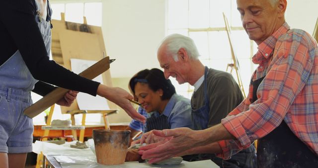 Senior Group Enjoying Pottery Class Together - Download Free Stock Images Pikwizard.com