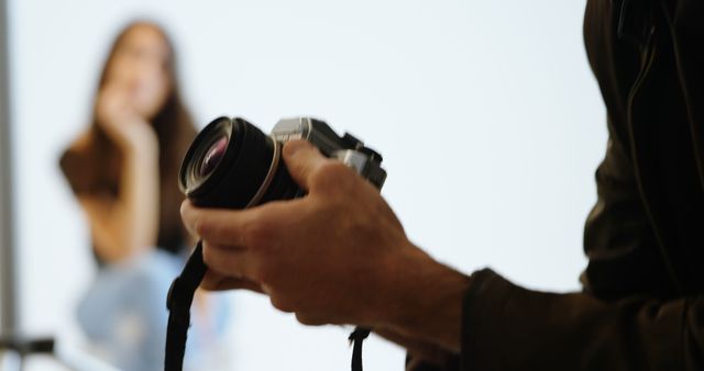 Photographer captures a young biracial woman in a studio - Download Free Stock Photos Pikwizard.com