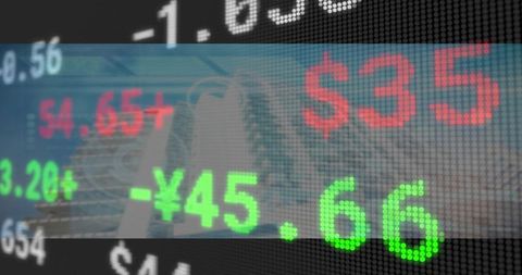 Digital Stock Market Ticker Display on Urban Skyscraper Backdrop