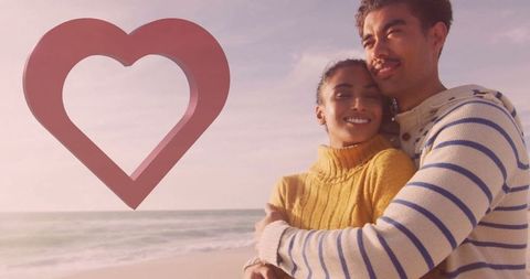 Romantic Couple Embracing on Beach with Heart Icon