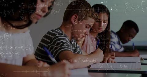 Students Solving Math Problems in Classroom with Formulas Overlay