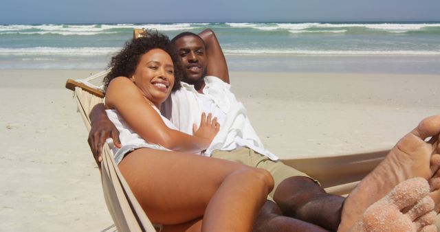 Young Happy Couple Relaxing on Hammock at Sunny Beach - Download Free Stock Images Pikwizard.com