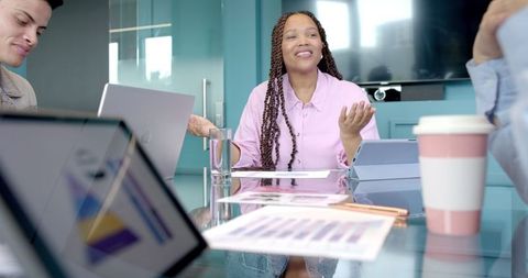 Smiling Businesswoman Leading Productive Office Meeting Discussion - Download Free Stock Images Pikwizard.com