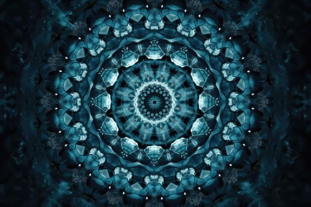 Detailed kaleidoscope pattern displaying blue geometric shapes arranged in radial symmetry. Ideal for use in creative projects such as digital art, backgrounds, textiles, and designs seeking intricate decorative patterns. Suitable as a visual asset in meditation apps, promotional materials, or as a unique print piece.