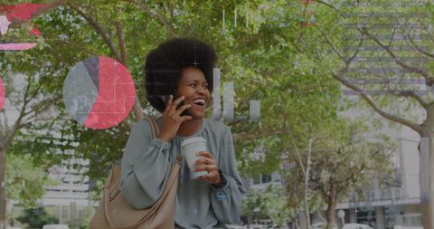 Businesswoman Discussing Data on Smartphone Outdoors