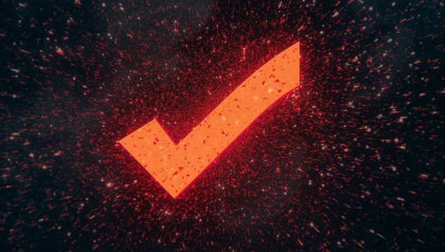 Glowing red check mark with futuristic particle effect
