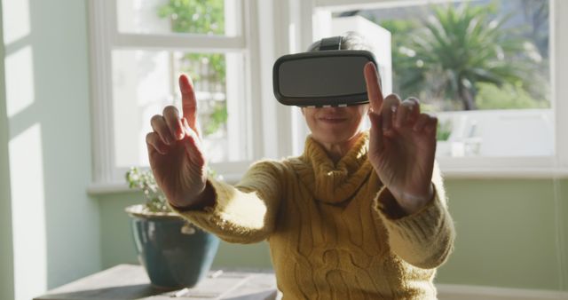 Woman Experiencing Virtual Reality at Home with VR Headset - Download Free Stock Images Pikwizard.com