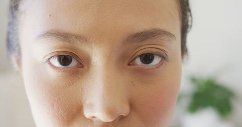 Close-Up of Woman Looking into Camera for Introspective Mood