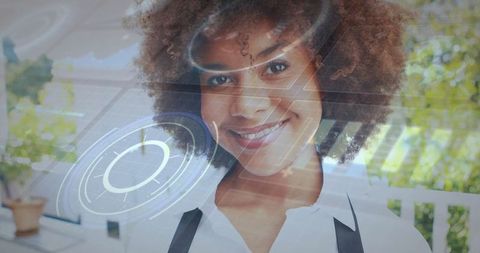 Professional woman using futuristic holographic technology interface