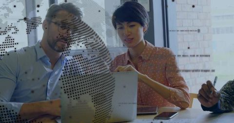 Multinational Team in Office Collaborating on Project