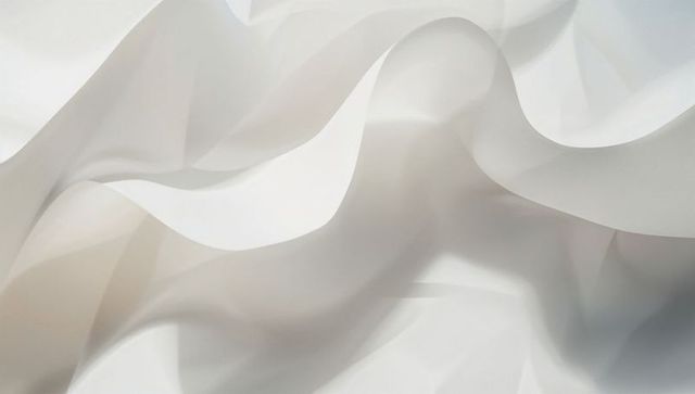 Abstract folds of translucent white fabric in fluid formations