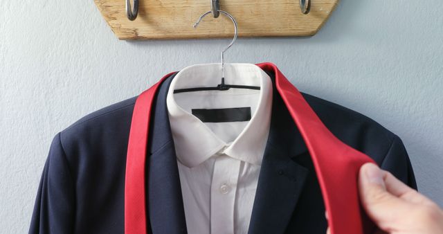 Man Preparing Suit and Tie for Formal Event - Download Free Stock Images Pikwizard.com