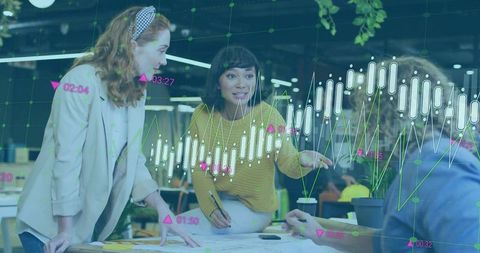 Team brainstorming in modern open-plan workspace